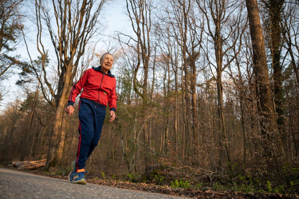 Senior runner maintaining physical fitness outdoors